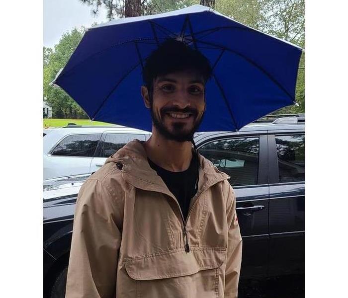 Owner with umbrella hat